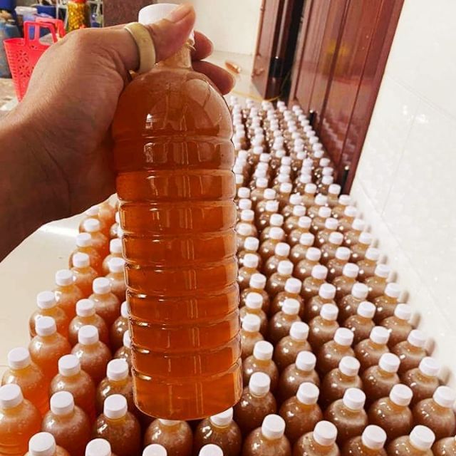 Mật ong nguyên chất đặc sánh y hình bao test chai 1000ml