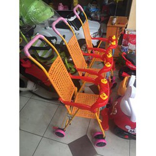Xe đẩy nhựa giả mây cho bé.