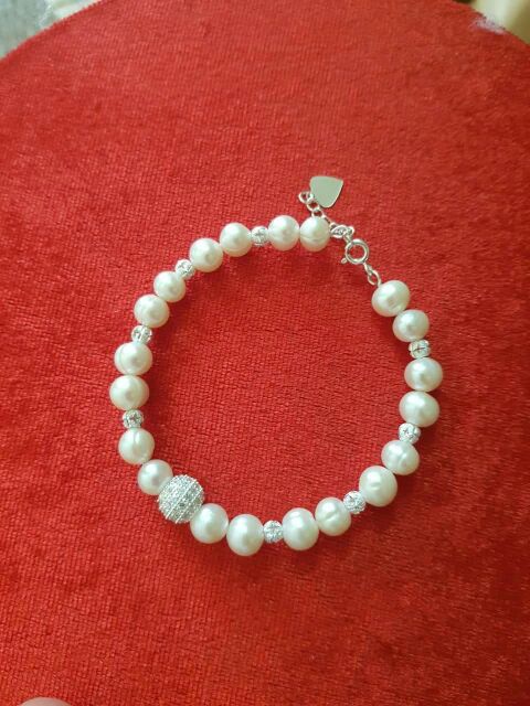 Vòng tay trai nuôi phối bạc