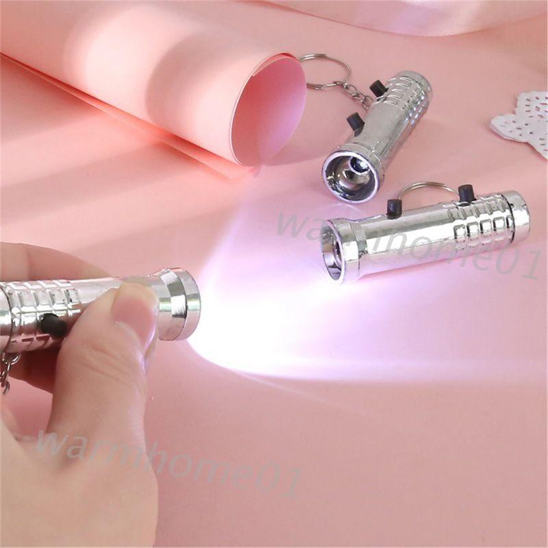 Móc Khóa Đèn Pin Chiếu Tia Uv 2 Trong 1 Cho Bé