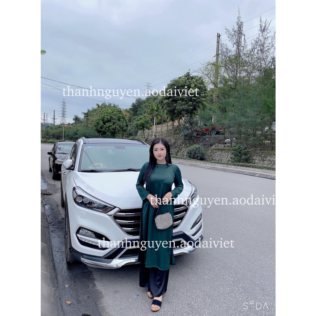 Áo dài xanh rêu đậm dáng suông truyền thống lụa Tây Thi