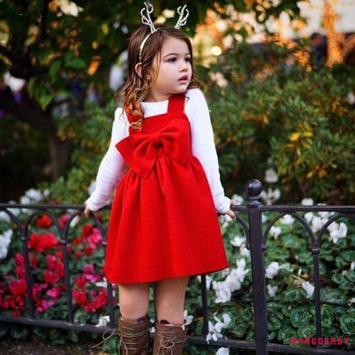 Đầm xòe phong cách công chúa phối nơ đỏ phong cách Giáng sinh mới nhất cho bé gái