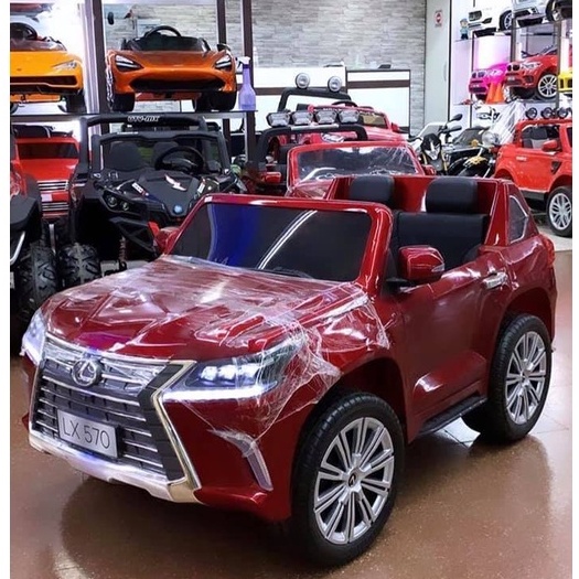 Ô tô điện trẻ em KIDVIET-PRO LEXUS 570 bánh hơi ghế da cao cấp sơn quây (Đỏ-Trắng-Xanh-Đen)