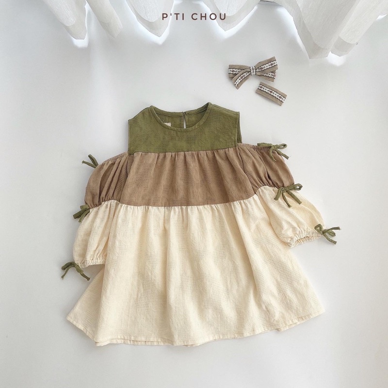 Naeon dress Váy bé gái thiết kế P'ti chou hở vải mix màu và nơ cho bé 12kg đến 23kg