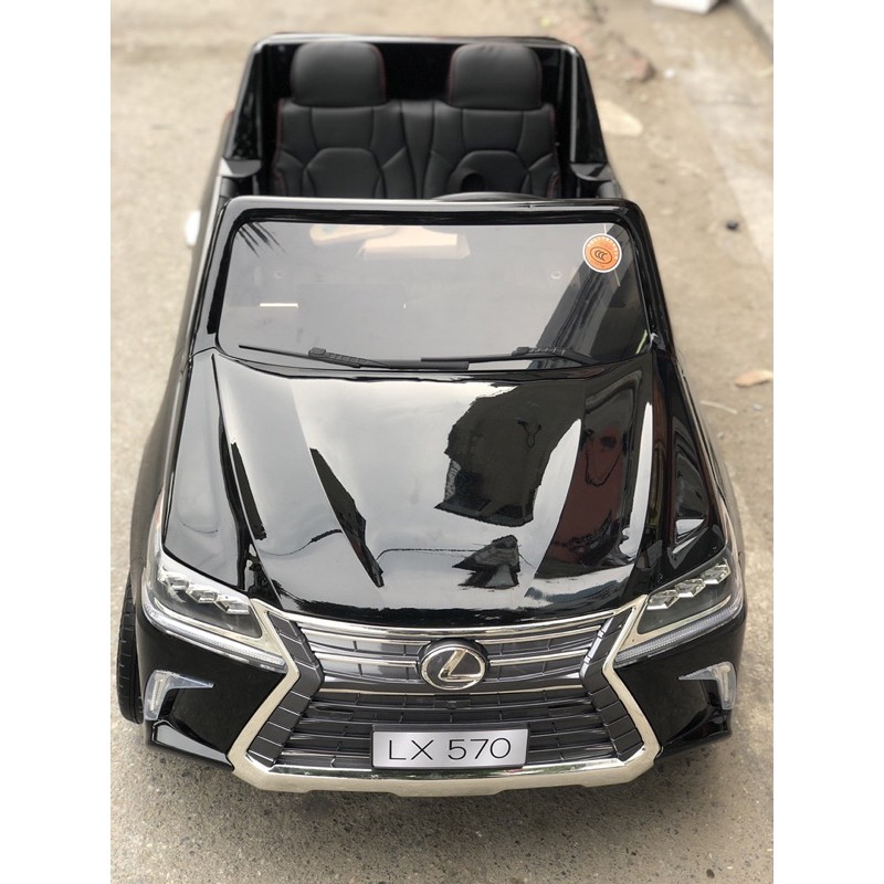 Ô tô điện trẻ em siêu sang Lexus LX570 bánh cao su, ghế da, sơn tĩnh điện( bản quyền Lexus,hàng có sẵn)