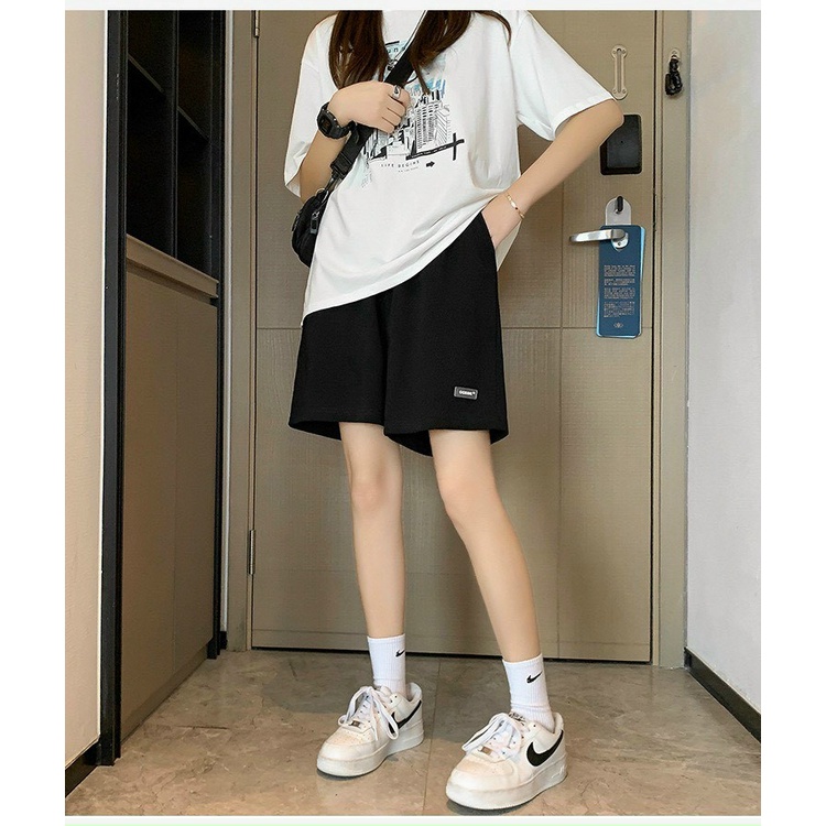 Quần đùi có logo unisex phom rộng phong cách đường phố dành cho nam và nữ | BigBuy360 - bigbuy360.vn