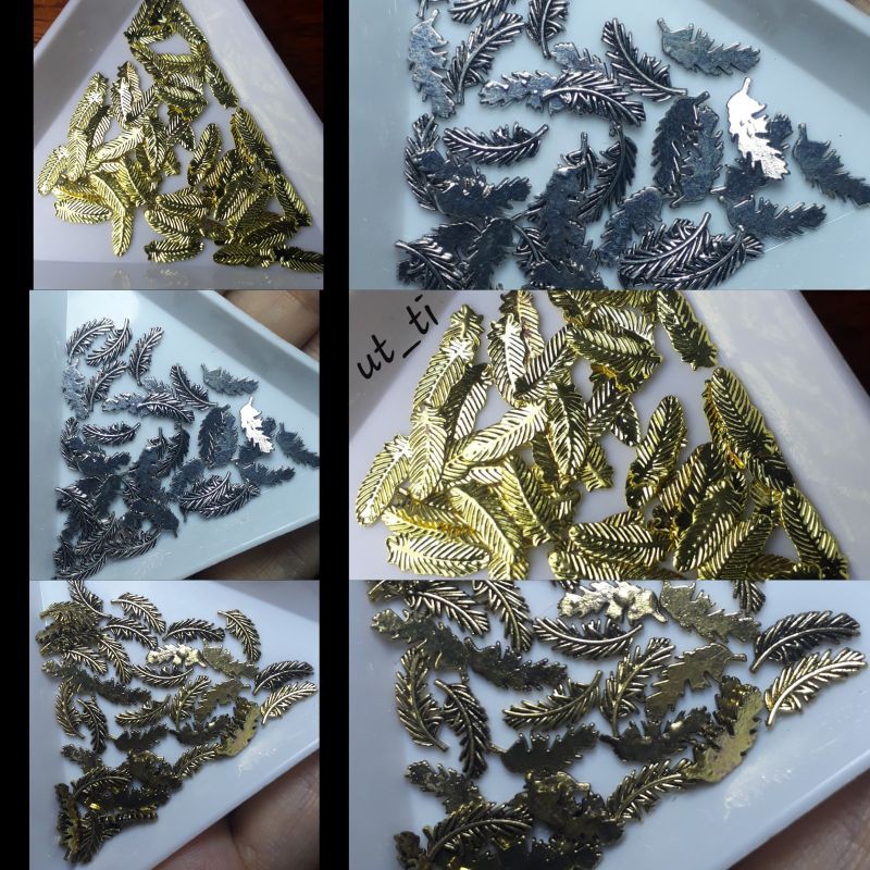 Charm lá lông vũ mã 4