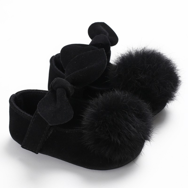 Giày màu trơn đính bông tròn xinh xắn cho bé gái