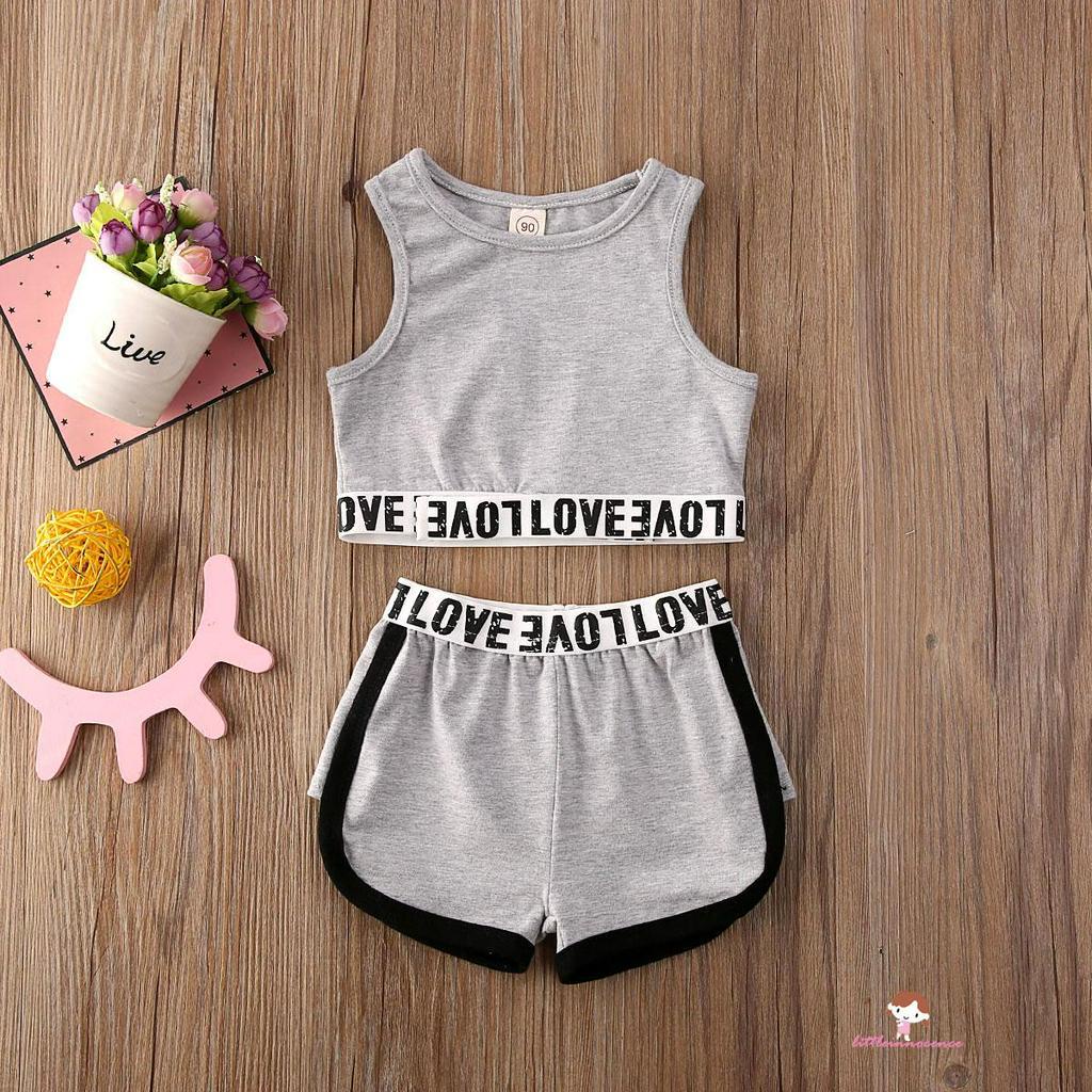 Set Áo Croptop Sát Nách Hoạ Tiết Chữ In + Quần Sọt Cho Bé Gái
