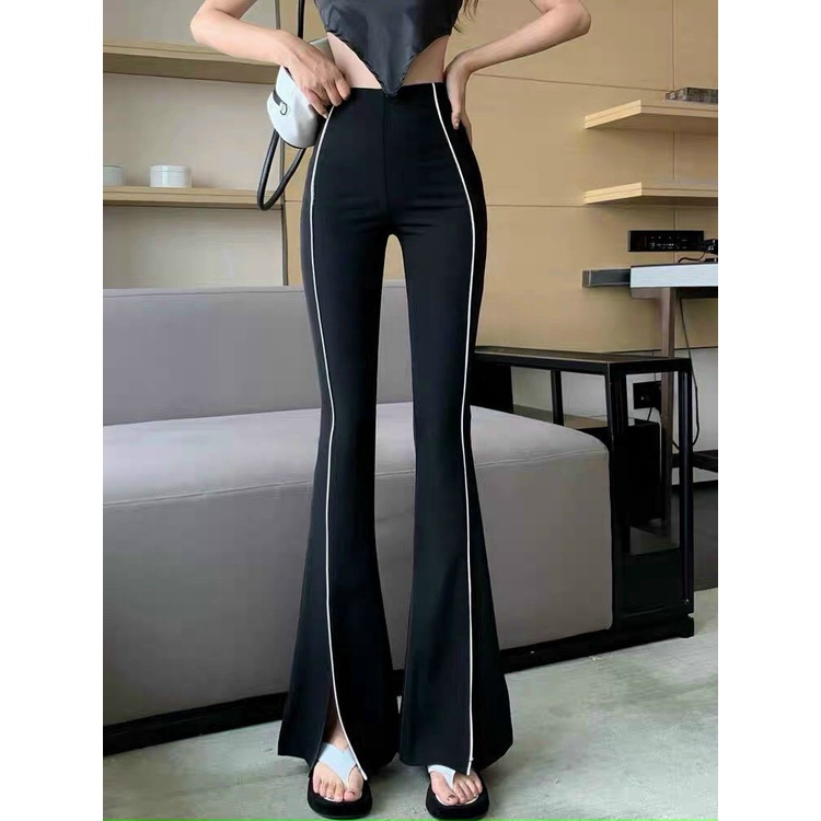 Quần thun lưng cao ống loe xẻ tà dưới kiểu 1 sọc đứng cực hot , chất thun quảng châu dày dặn chuẩn form