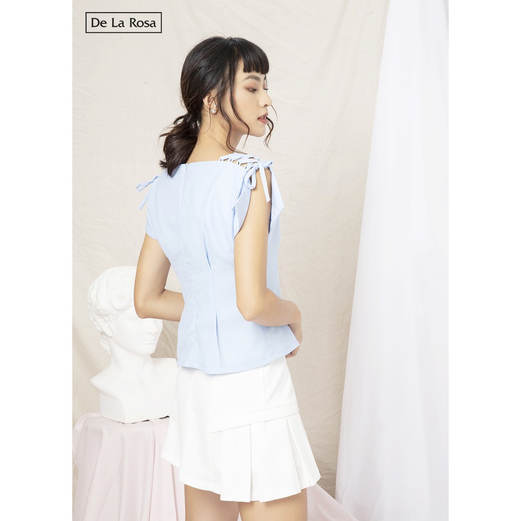 Chân váy trắng thiết kế rã túi xếp ly - De La Rosa | BigBuy360 - bigbuy360.vn