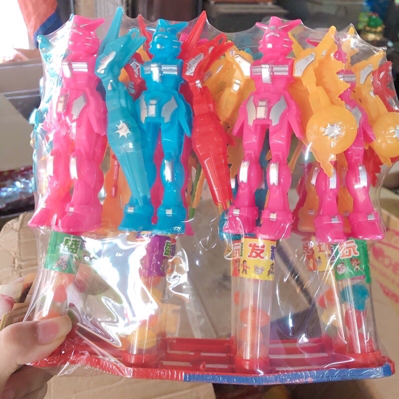 sỉ lốc 12 hũ kẹo dẻo bi kèm siêu nhân có cánh