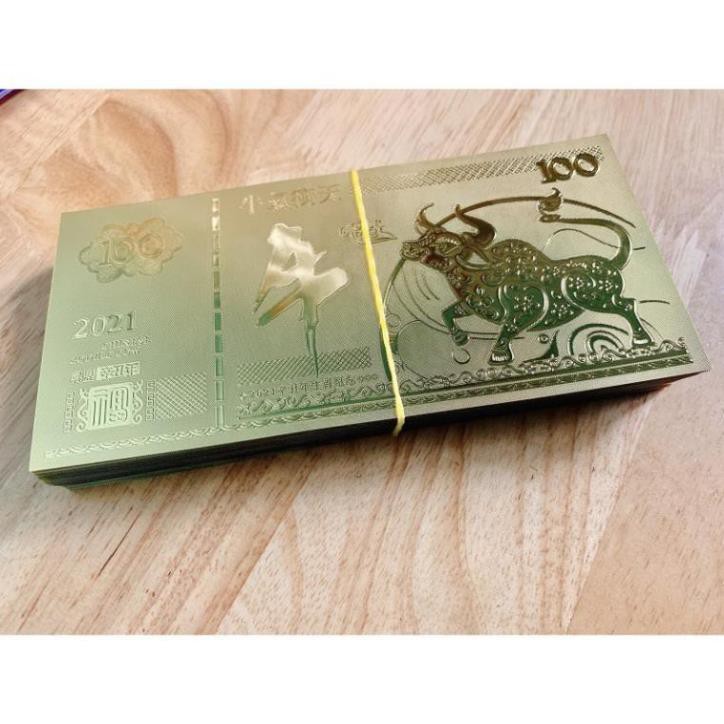 Tiền Con Trâu Macao Vàng Lì Xì Tết 2021 - Tien 100 Macao Plastic Vang Li Xi Tet