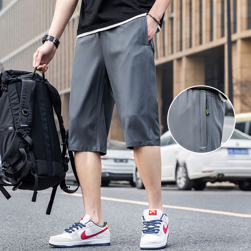 Quần Short Thể Thao Ống Rộng Màu Sắc Trơn Nhanh Khô Có Túi Khóa Kéo Thời Trang Mùa Hè Dành Cho Nam