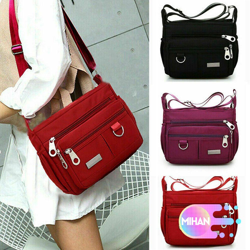 Túi xách đeo chéo bằng vải oxford chống thấm nước thiết kế nhiều ngăn tiện dụng