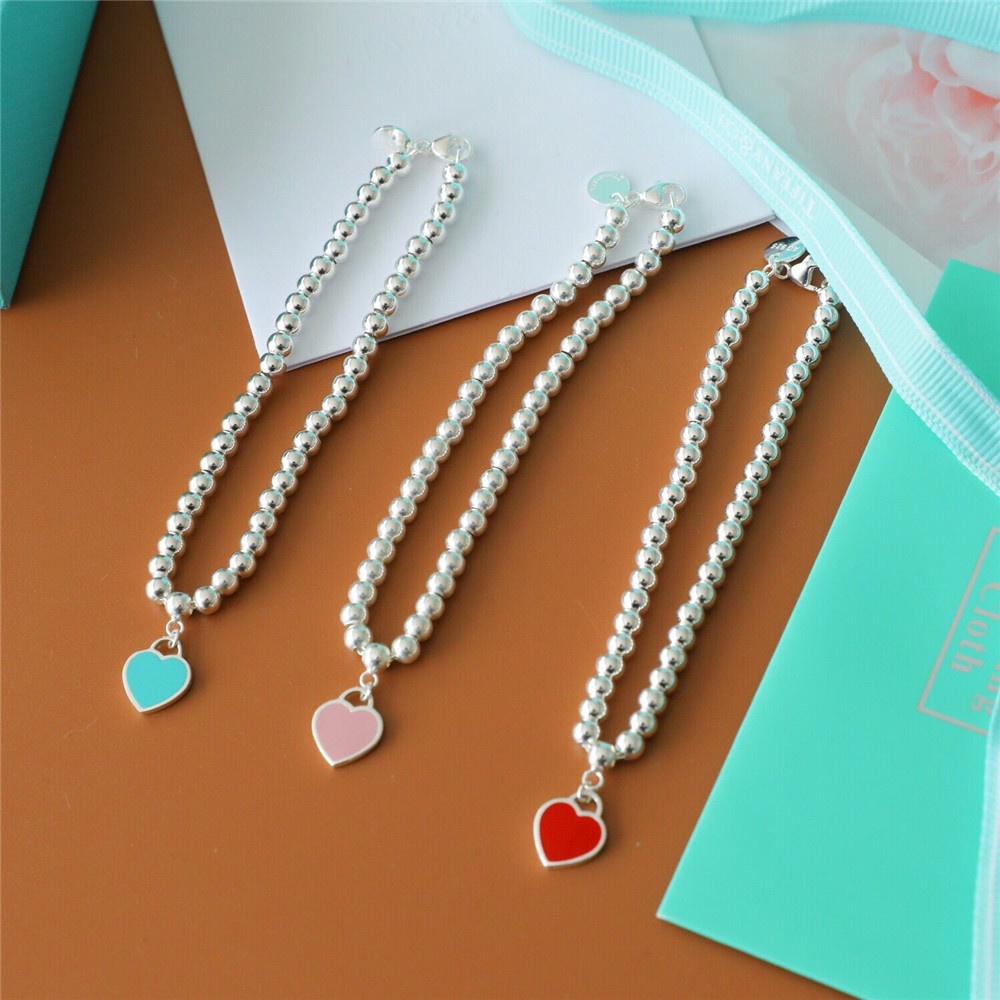 1 vòng tay chuỗi hạt hình trái tim ba màu sắc thời trang cho nữ