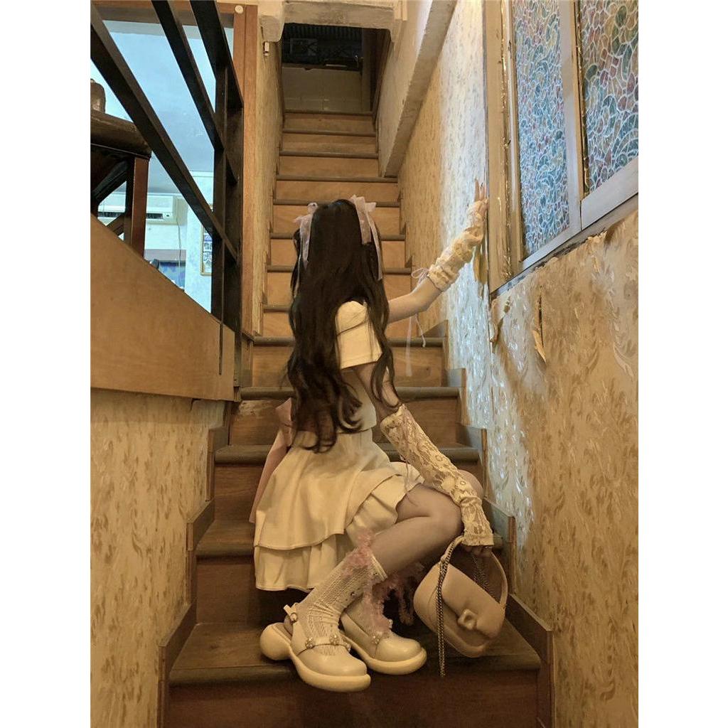 Set Áo Cổ polo + Chân Váy Ngắn Màu Hồng Đính Nơ Xinh Xắn Thời Trang