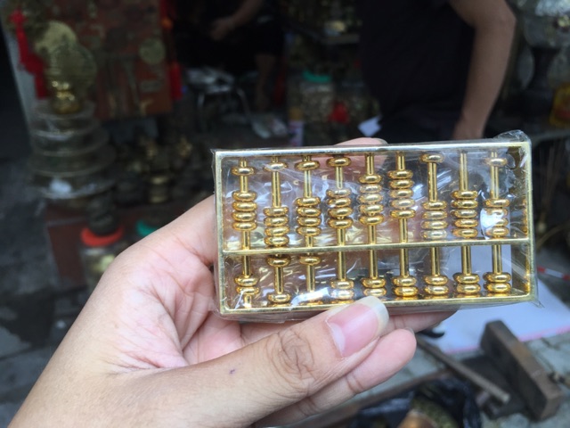 Bàn Tính Phong Thuỷ Buôn May Bán đắt