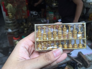 Bàn Tính Phong Thuỷ Buôn May Bán đắt