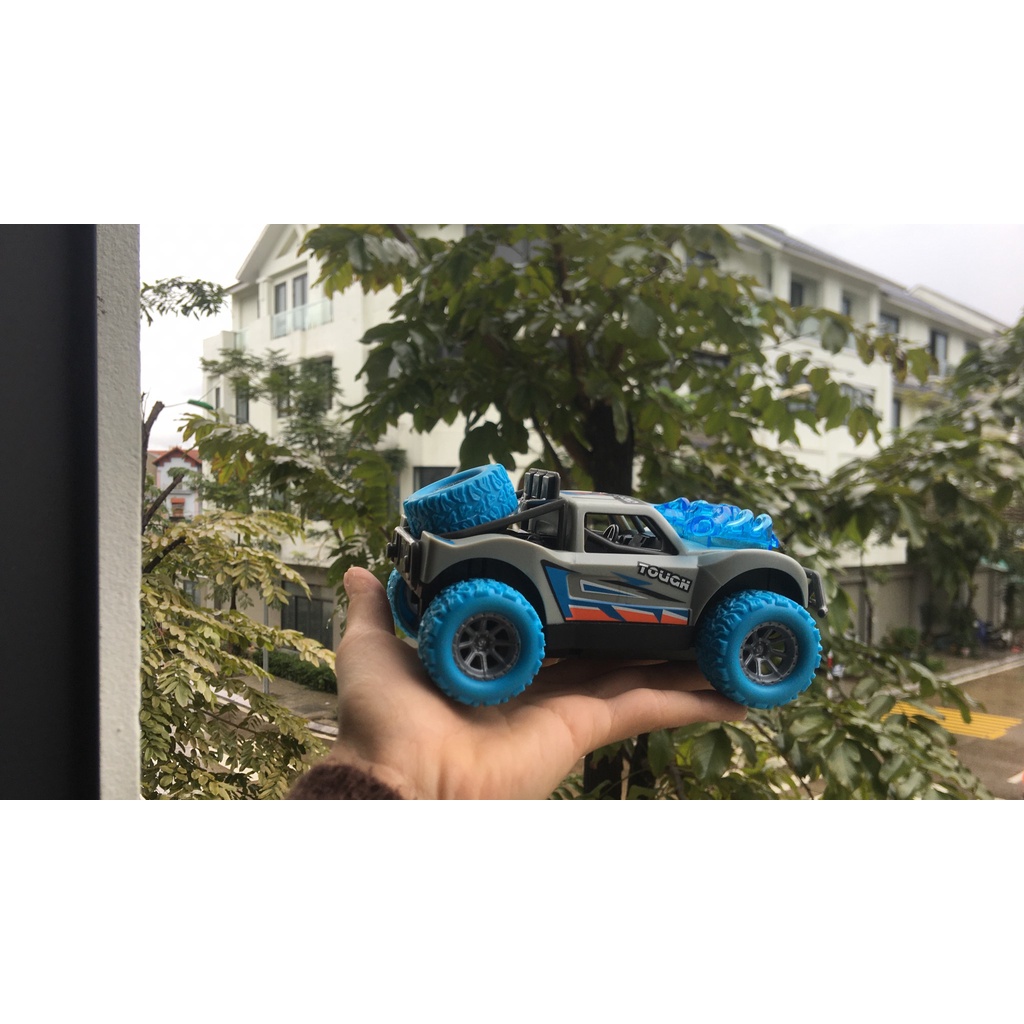 Đồ chơi cho bé mô hình xe ô tô địa hình có âm thanh ánh sáng chạy đà xoay 360 độ