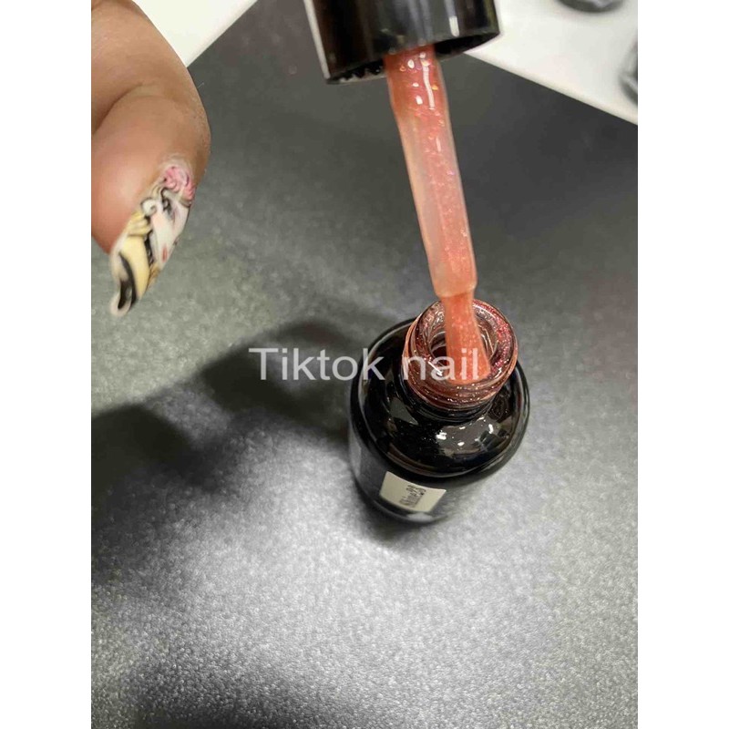 Top nhủ hoa Hồng