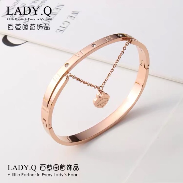 Lắc tay trái tim vàng hồng