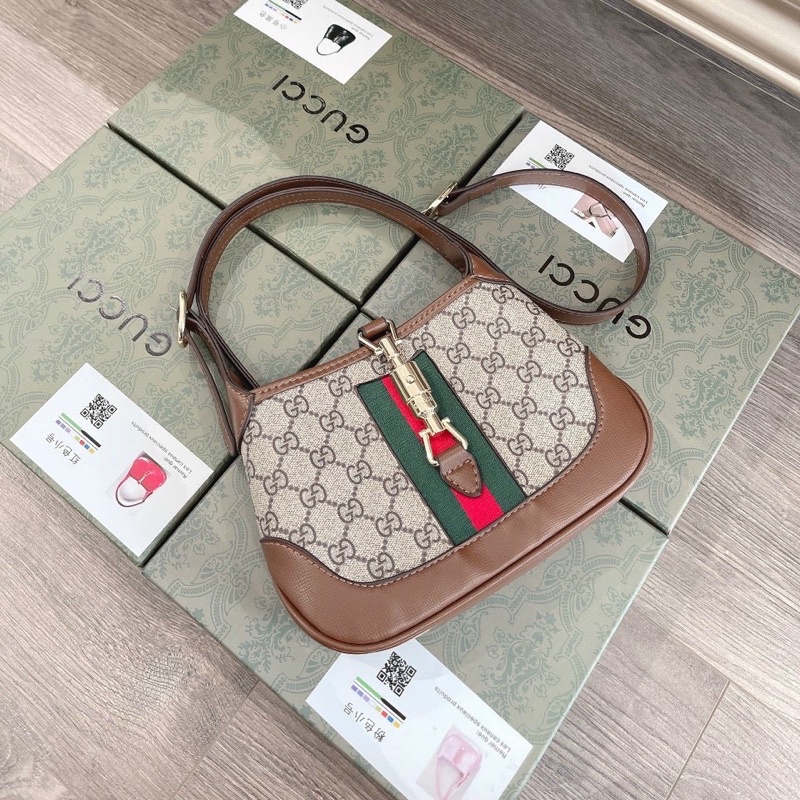 Túi cầm tay gc jackie