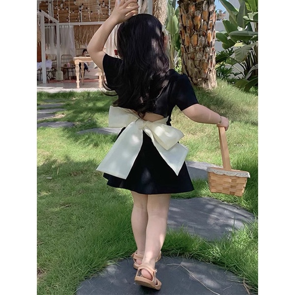 bộ đen croptop nơ sau hở lưng bé gái