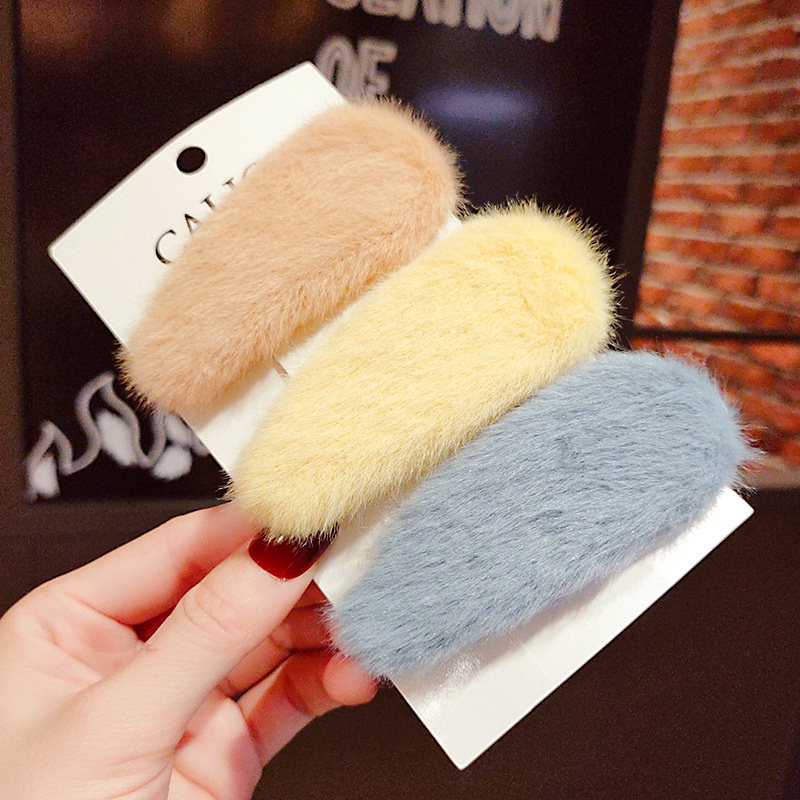 Kẹp tóc mái phối lông dễ thương hình elip