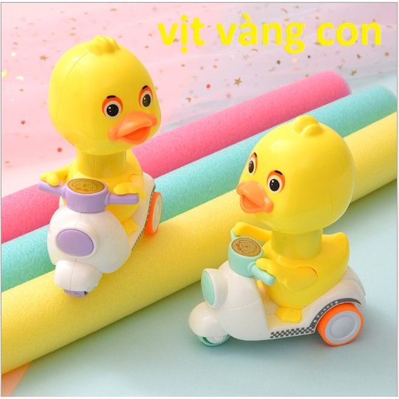 Đồ chơi dây cót con vịt đồ chơi cho bé vịt đi xe Vespa nhấn đầu là chạy