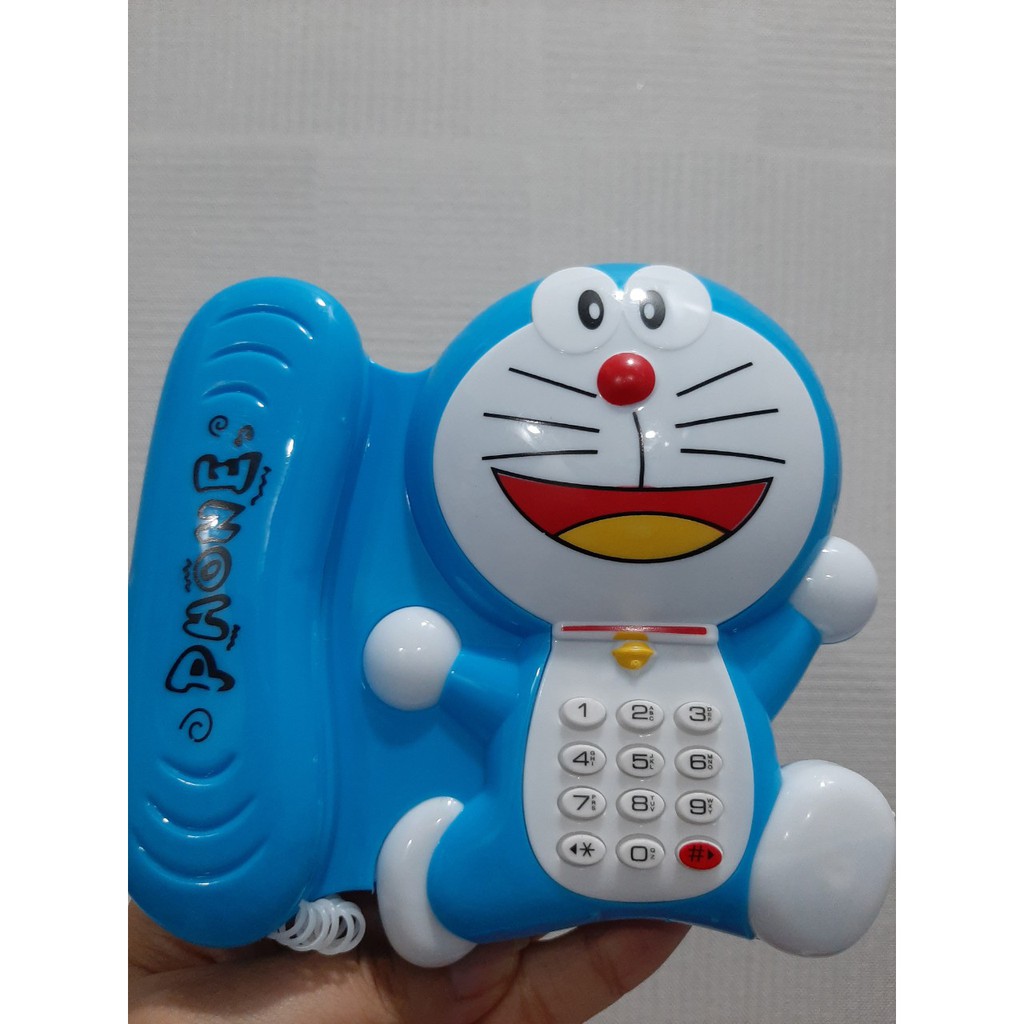 Đồ Chơi Phát Nhạc Kiểu Dáng Điện Thoại Bàn Hình Doraemon Dễ Thương Cho Bé (Tặng Kèm Pin)