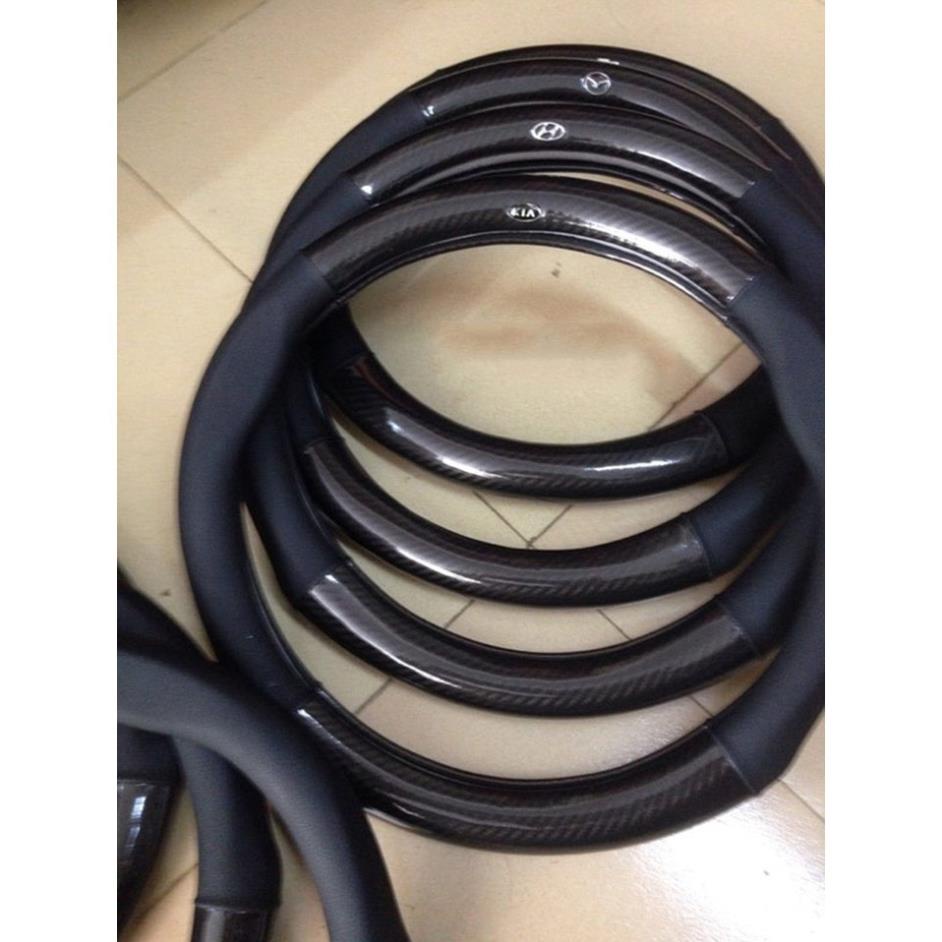 Bọc vô lăng xe ford everest focus ranger ecosport fiesta explorer transit escape chất liệu da vân cacbon