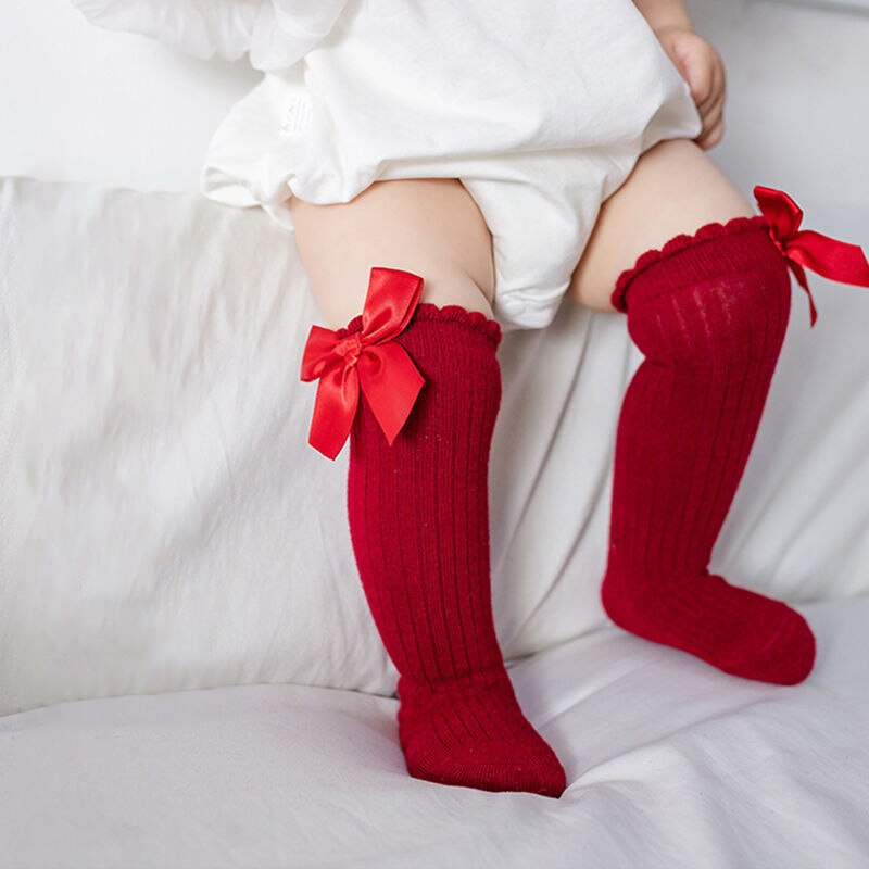 Vớ Cotton Mềm Cao Đến Đầu Gối Chống Trượt Màu Trơn Đính Nơ Thời Trang Thu Đông Cho Bé Sơ Sinh