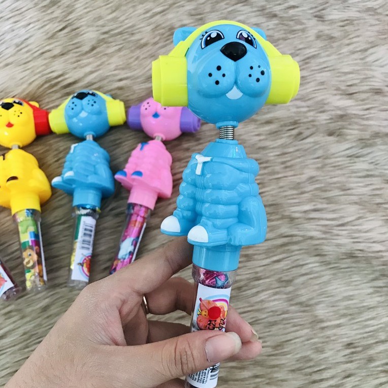 Đồ Chơi Con Chó Lắc Lư Đầu Có Kẹo Và Có Đèn Phát Sáng