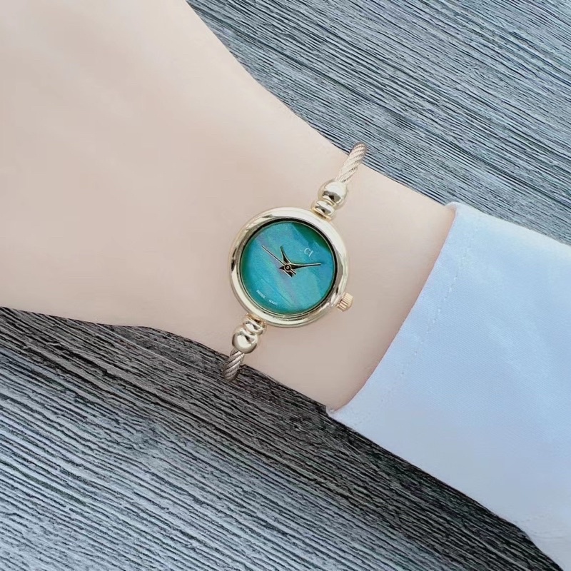 Đồng Hồ Nữ Mặt Tròn Kiêm Lắc Tay Cucci Dạng Kiềng Bạc Mặt Nhỏ