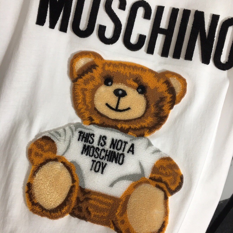 áo phông dài tay cổ tròn, trắng đen gấu bông mới đàn tranh thêu chữ moschino