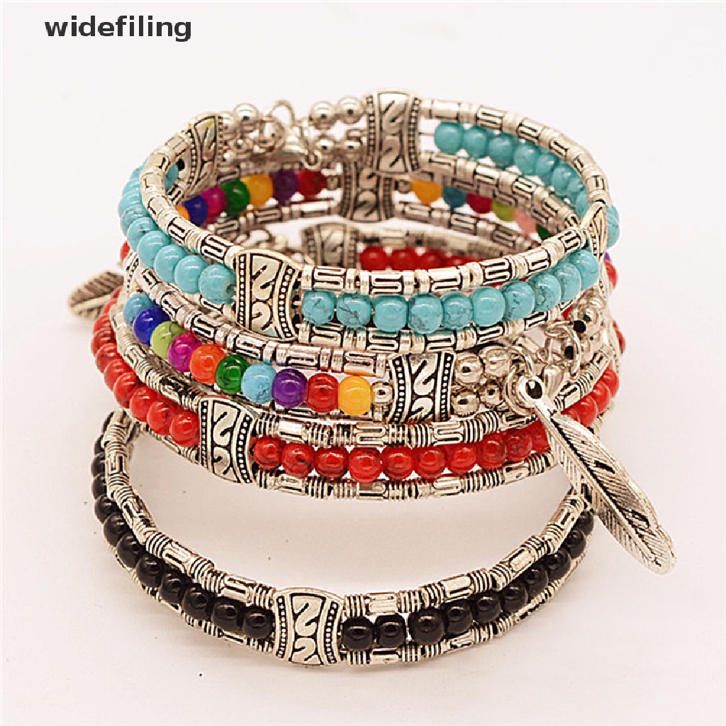 Vòng tay bạc xỏ hạt mặt dây hình lông vũ phong cách Bohemian thời trang cho nữ