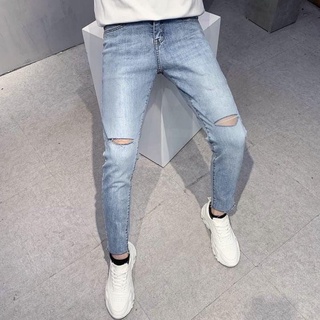 Quần bò nam màu xanh rách gối chất liệu co giãn tốt kiểu dáng trẻ