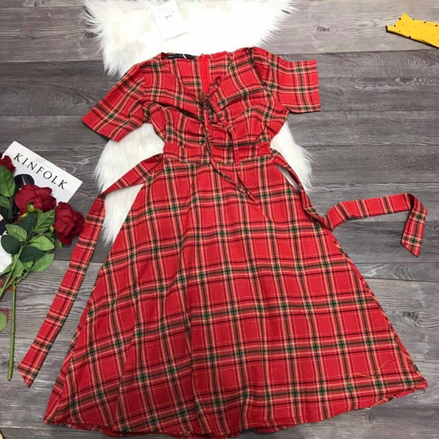 Đầm xoè caro tay con cột nơ sau