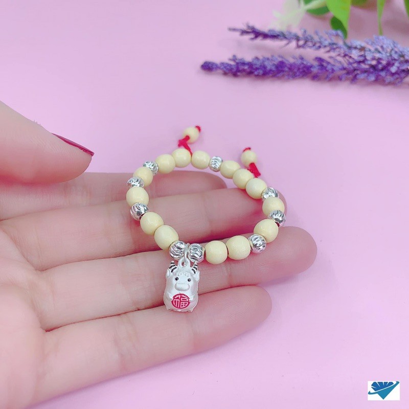 Vòng dâu tằm treo charm trâu xinh chuẩn bạc ta cho bé
