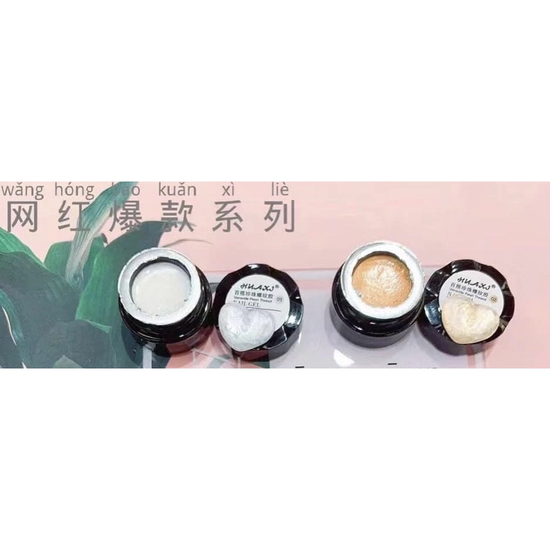 Hũ gel ánh trai màu trắng và cam trang trí móng