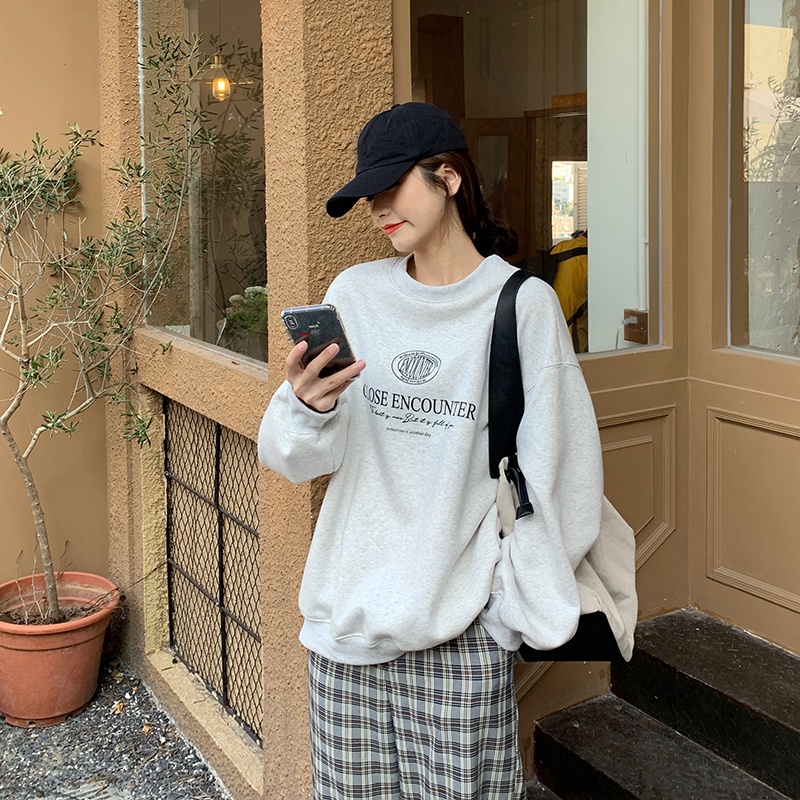 Áo thun tay dài dáng rộng in chữ phong cách Hàn Quốc thời trang cho nữ