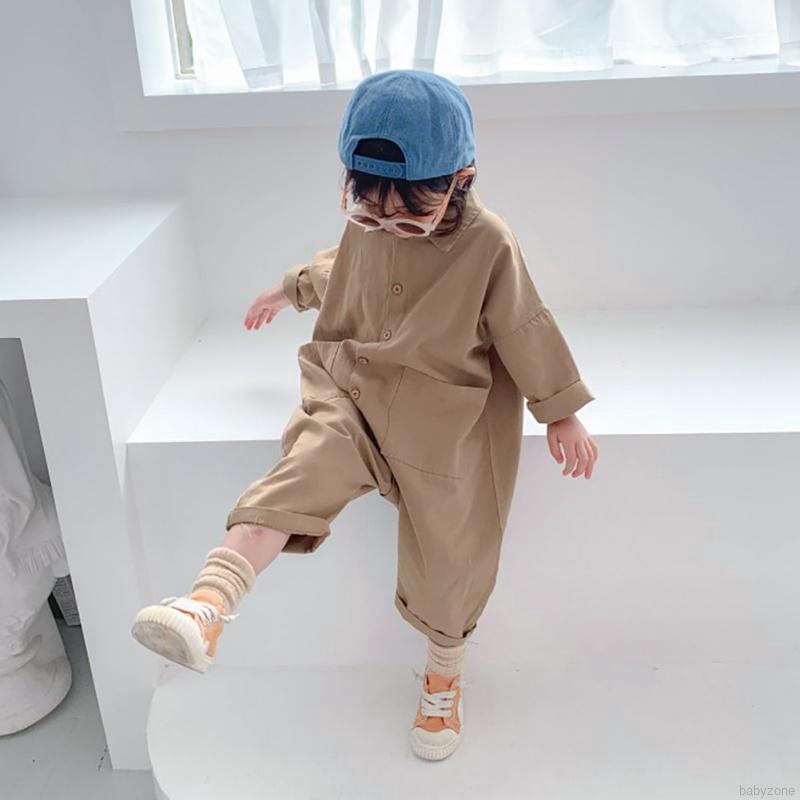 Áo liền quần dài tay đính nút thời trang cho bé