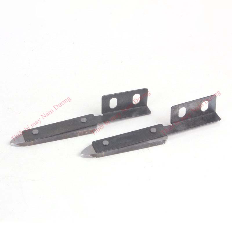 Dao gạt vải dưới máy cắt vải đầu bàn
