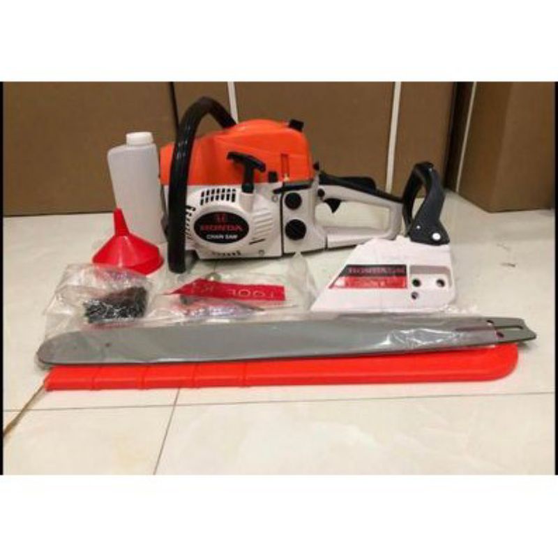 máy cưa xích chạy xăng động cơ2 thì 68cc BẢO HÀNH 12 THÁNG