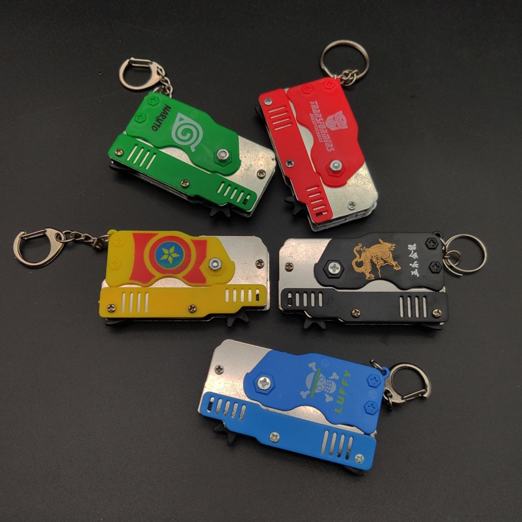 Súng Bắn Dây Thun Móc Chìa Khoá Dạng Đồ Chơi Gấp Gọn Tặng Kèm Dây Thun