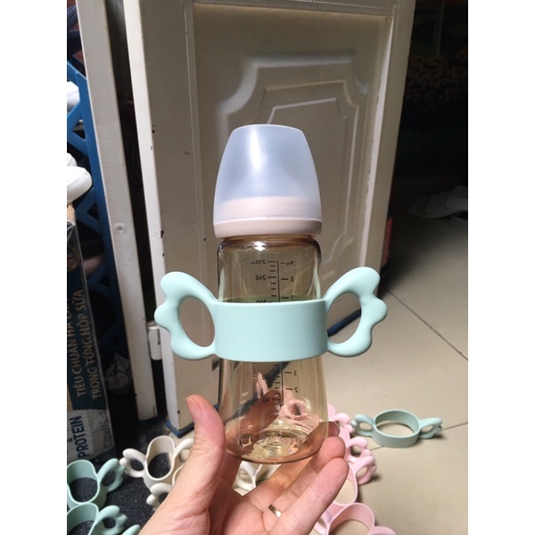 TAY CẦM BÌNH SỮA SILICON Cánh tiên gắn moy, avent, piegon