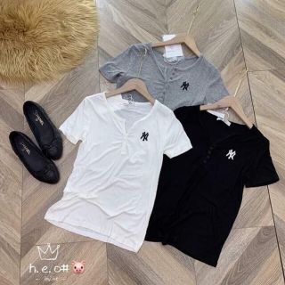 Áo phông cúc cài cổ túi zip