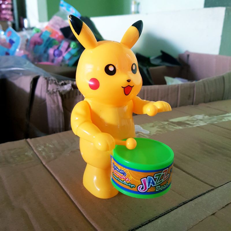 Đồ chơi pikachu đánh trống vặn cót