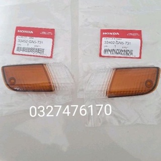 Cặp nắp chụp võ đèn xi nhan trước xe DREAM lùn zin honda thái